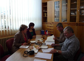 The English teachers are working on our project in their office