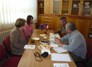 The English teachers are working on our project in their office